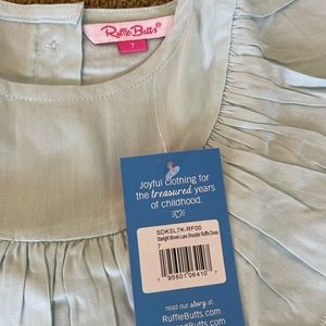 Rufflebutts size 7 dress, NEW with tags. Light blue short sleeve.